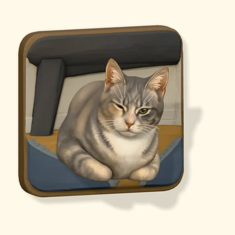 Silver tabby sitting on a blue cushion in a home scene on a Poptile magnet.
